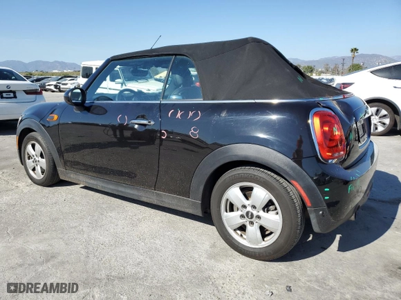 2019 MINI Cooper Convertible with VIN WMWWG5C59K3H08999, listed as a Copart auction lot 49778175 with 35,879 mi miles and Salvage Title. Bid and sale history available at carsss.com. Image 2.