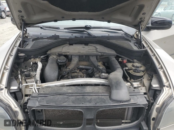 2010 BMW X5 35d with VIN 5UXFF0C5XALT75361, listed as a Copart auction lot 57640615 with 156,784 mi miles and Salvage title. Bid and sale history available at DreamBid. Image 12.