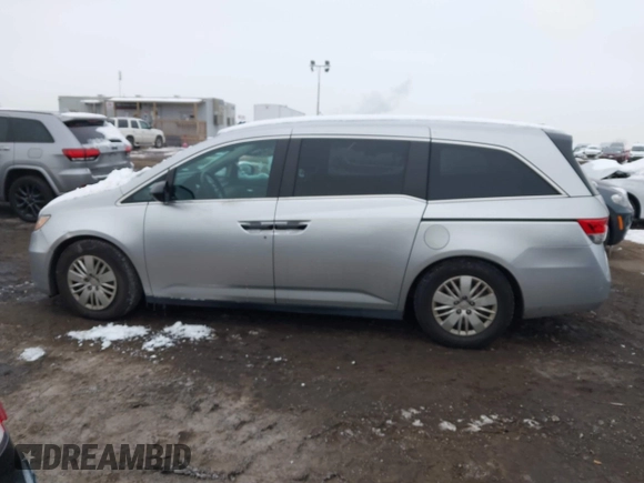 2014 Honda Odyssey LX with VIN 5FNRL5H22EB080346, listed as a IAAI auction lot 41282783 with 101,000 mi miles and . Bid and sale history available at carsss.com. Image 14.