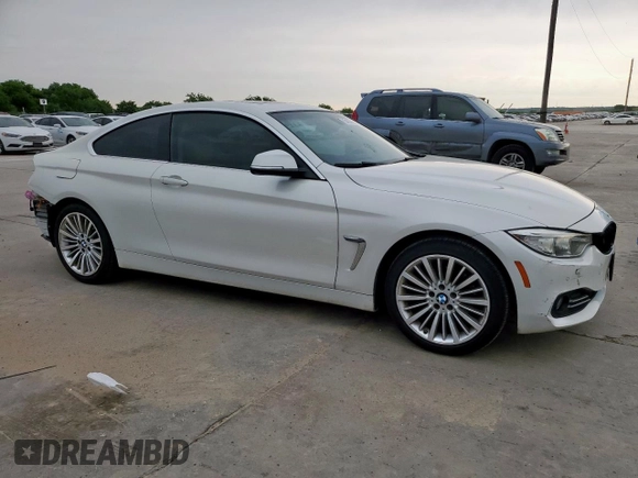 2015 BMW 4 Series 428i с VIN WBA3N3C5XFK234700, выставлен на аукционе Copart как лот 54837525 с пробегом 133 341 миль миль и Списание • Salvage title. История ставок и продаж доступна на DreamBid. Изображение 4.