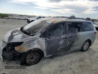 2015 Toyota Sienna XLE with VIN 5TDYK3DC4FS672992, listed as a Copart auction lot 52775715 with Not Provided miles and Non Repairable. Bid and sale history available at DreamBid. Image 1.