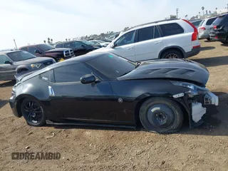 2009 Nissan 370Z Touring with VIN JN1AZ44E39M408668, listed as a IAAI auction lot 41231840 with 93,826 mi miles and . Bid and sale history available at DreamBid. Image 14.