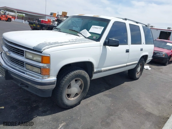 1997 Chevrolet Tahoe with VIN 1GNEK13R6VJ443195, listed as a IAAI auction lot 42000733 with 202,106 mi miles. Bid and sale history available at carsss.com. Image 2.
