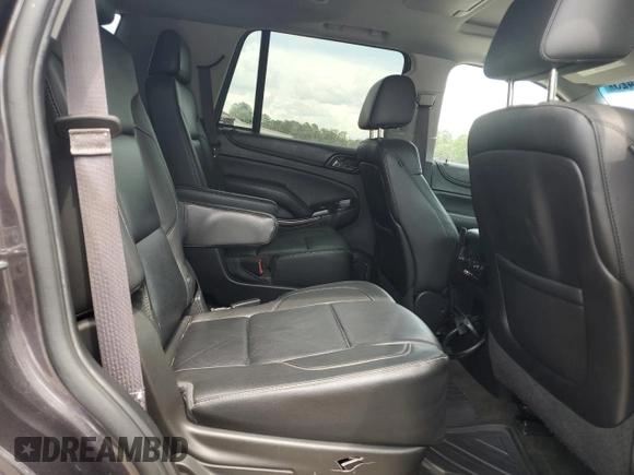 2015 Chevrolet Tahoe LT with VIN 1GNSCBKC1FR240186, listed as a Copart auction lot 64741425 with 110,357 mi miles and Salvage title. Bid and sale history available at DreamBid. Image 11.