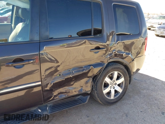 2012 Honda Pilot Touring with VIN 5FNYF4H99CB069996, listed as a IAAI auction lot 41809046 with 140,836 mi miles and . Bid and sale history available at DreamBid. Image 6.