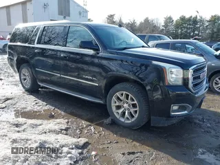 2015 GMC Yukon XL SLT with VIN 1GKS2HKC9FR159164, listed as a IAAI auction lot 41708822 with 136,730 mi miles. Bid and sale history available at carsss.com. Image 1.