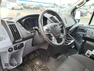 2015 Ford Transit Cargo z VIN 1FTNR1ZM8FKA55185, wystawiony jako IAAI lot #42515954 z przebiegiem 86 918 mil mil oraz . Historia ofert i sprzedaży dostępna na DreamBid. Obrazek 1.