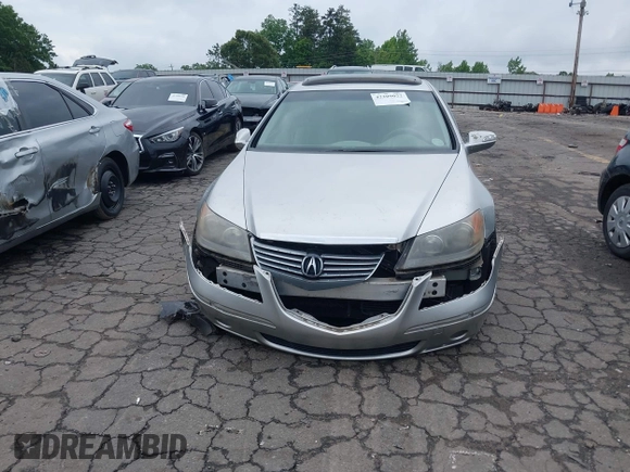 2005 Acura RL с VIN JH4KB16595C017766, выставлен на аукционе IAAI как лот 42209022 с пробегом 225 862 миль миль и . История ставок и продаж доступна на DreamBid. Изображение 12.