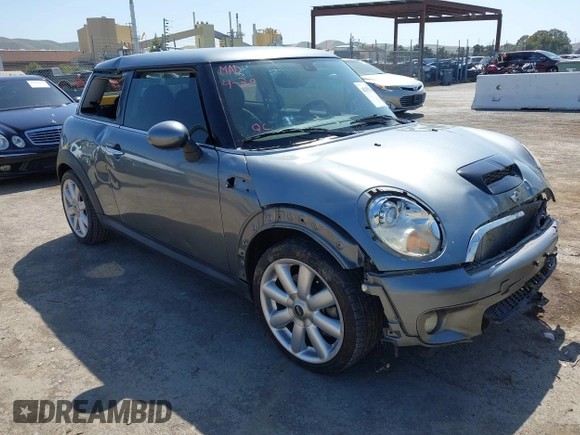 2007 MINI Hardtop S with VIN WMWMF73597TL86892, listed as a IAAI auction lot 42157544 with 93,097 mi miles and . Bid and sale history available at DreamBid. Image 1.