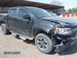 2021 Chevrolet Colorado 4WD Z71 z VIN 1GCGTDEN1M1256939, wystawiony jako IAAI lot #42071364 z przebiegiem 38 972 mil mil oraz . Historia ofert i sprzedaży dostępna na DreamBid. Obrazek 6.