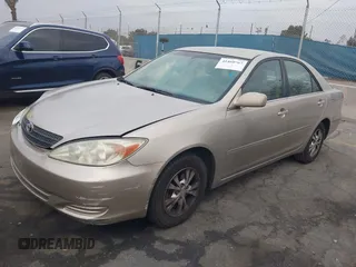 2004 Toyota Camry LE with VIN 4T1BF32K44U069081, listed as a IAAI auction lot 41460767 with 204,992 mi miles and . Bid and sale history available at carsss.com. Image 18.