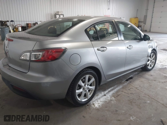 2011 Mazda Mazda3 i Touring with VIN JM1BL1VFXB1900999, listed as a IAAI auction lot 42067239 with 202,829 mi miles. Bid and sale history available at carsss.com. Image 4.