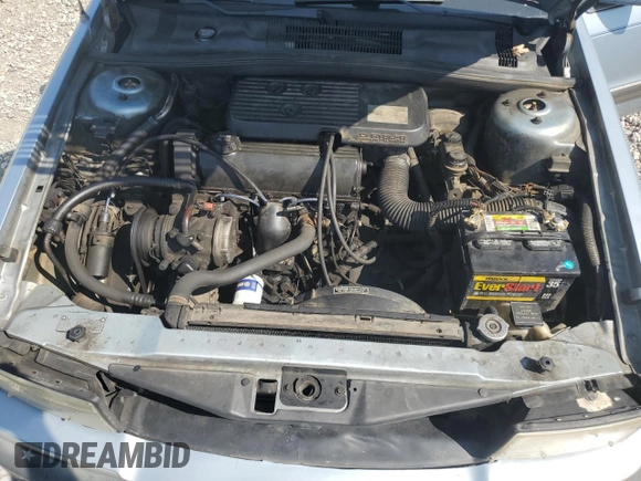 1989 Dodge Spirit z VIN 1B3BA46K1KF408949, wystawiony jako Copart lot #80767594 z przebiegiem 137 766 mil mil oraz Nie do naprawy. Historia ofert i sprzedaży dostępna na DreamBid. Obrazek 11.