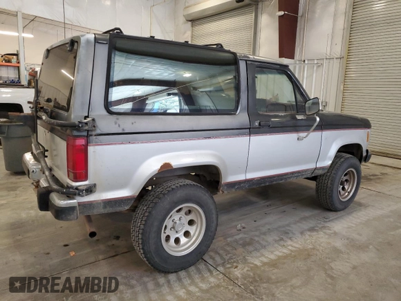 1988 Ford Bronco with VIN 1FMCU14T4JUA54161, listed as a Copart auction lot 76312054 with 34,932 mi miles and Salvage title. Bid and sale history available at DreamBid. Image 3.