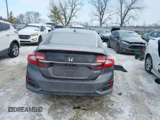 2018 Honda Clarity z VIN JHMZC5F13JC006627, wystawiony jako IAAI lot #41335364 z przebiegiem 58 662 mil mil oraz . Historia ofert i sprzedaży dostępna na DreamBid. Obrazek 16.