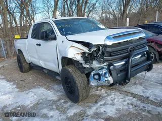 2014 Toyota Tundra 4WD Truck SR with VIN 5TFUY5F1XEX389686, listed as a IAAI auction lot 41381839 with 153,831 mi miles. Bid and sale history available at carsss.com. Image 1.
