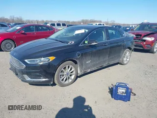 2018 Ford Fusion Energi SE with VIN 3FA6P0PU8JR152890, listed as a IAAI auction lot 41682965 with 84,890 mi miles. Bid and sale history available at carsss.com. Image 17.