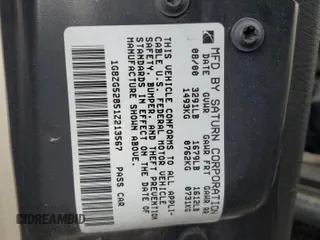 2001 Saturn SL z VIN 1G8ZG52851Z213567, wystawiony jako Copart lot #51795795 z przebiegiem Nie podano mil oraz Szkoda całkowita • Salvage title. Historia ofert i sprzedaży dostępna na DreamBid. Obrazek 12.