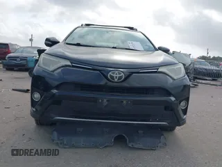 2017 Toyota RAV4 XLE with VIN 2T3WFREVXHW352608, listed as a IAAI auction lot 41921190 with 157,608 mi miles. Bid and sale history available at carsss.com. Image 6.