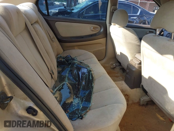 2000 Nissan Maxima GXE with VIN JN1CA31D4YT556029, listed as a IAAI auction lot 42160508 with 227,696 mi miles and . Bid and sale history available at DreamBid. Image 8.