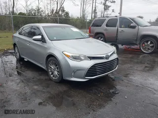 2016 Toyota Avalon Hybrid XLE Premium with VIN 4T1BD1EBXGU052909, listed as a IAAI auction lot 41587776 with 87,856 mi miles. Bid and sale history available at carsss.com. Image 1.