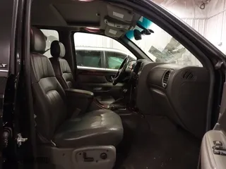 2004 GMC Envoy SLE with VIN 1GKDT13S542265104, listed as a IAAI auction lot 41884797 with 154,190 mi miles. Bid and sale history available at carsss.com. Image 5.