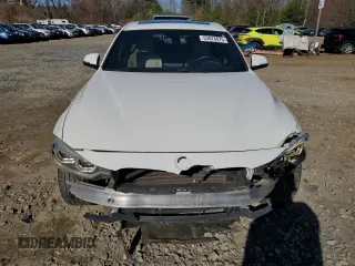 2017 BMW 3 Series 330i with VIN WBA8B9C51HK675636, listed as a Copart auction lot 53676075 with 103,580 mi miles and Clean Title. Bid and sale history available at carsss.com. Image 5.