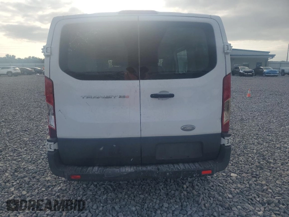 2015 Ford Transit Cargo with VIN 1FTNR1YM6FKA17391, listed as a Copart auction lot 56418755 with 247,093 mi miles and Salvage title. Bid and sale history available at DreamBid. Image 6.