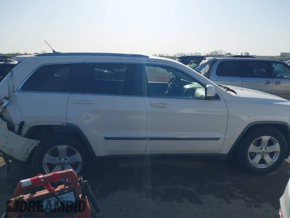 2011 Jeep Grand Cherokee Laredo with VIN 1J4RR4GG4BC703071, listed as a IAAI auction lot 41992878 with 126,199 mi miles and . Bid and sale history available at DreamBid. Image 13.