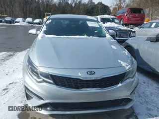 2019 Kia Optima LX z VIN 5XXGT4L3XKG294513, wystawiony jako IAAI lot #41345191 z przebiegiem 101 345 mil mil oraz . Historia ofert i sprzedaży dostępna na DreamBid. Obrazek 13.