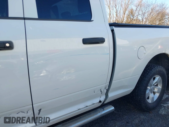 2014 Ram 1500 Tradesman z VIN 1C6RR7FT4ES428843, wystawiony jako IAAI lot #41461484 z przebiegiem 87 987 mil mil oraz . Historia ofert i sprzedaży dostępna na DreamBid. Obrazek 18.
