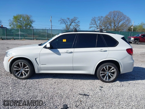 2015 BMW X5 xDrive50i with VIN 5UXKR6C5XF0J76697, listed as a IAAI auction lot 41953074 with 141,377 mi miles and . Bid and sale history available at DreamBid. Image 13.
