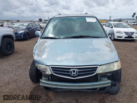 2004 Honda Odyssey EX-L with VIN 5FNRL18064B060817, listed as a IAAI auction lot 42032796 with 200,999 mi miles and . Bid and sale history available at DreamBid. Image 13.