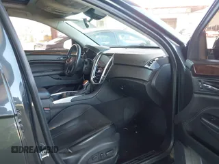 2014 Cadillac SRX Premium Collection z VIN 3GYFNDE31ES653114, wystawiony jako IAAI lot #42107858 z przebiegiem 125 192 mil mil oraz . Historia ofert i sprzedaży dostępna na DreamBid. Obrazek 5.