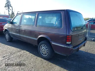1993 Dodge Grand Caravan with VIN 1B4GK44R4PX675504, listed as a IAAI auction lot 42010737 with 219,886 mi miles and . Bid and sale history available at DreamBid. Image 3.