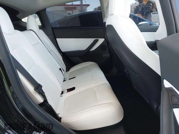 2022 Tesla Model Y Performance z VIN 7SAYGDEF0NF491586, wystawiony jako IAAI lot #42276747 z przebiegiem 117 203 mil mil oraz . Historia ofert i sprzedaży dostępna na DreamBid. Obrazek 8.