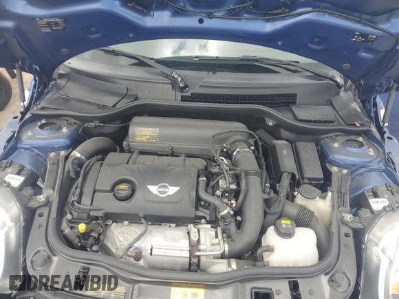 2015 MINI Convertible S with VIN WMWZP3C59F2A91231, listed as a Copart auction lot 59296415 with 31,642 mi miles and Salvage title. Bid and sale history available at DreamBid. Image 11.