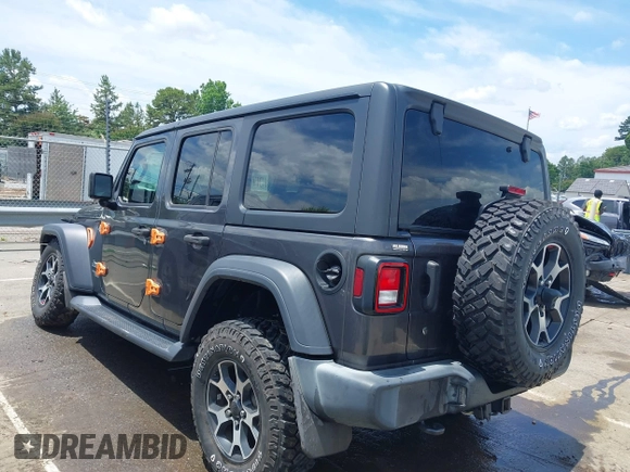 2019 Jeep Wrangler Unlimited Sport S with VIN 1C4HJXDN4KW577273, listed as a IAAI auction lot 42435847 with 69,403 mi miles and . Bid and sale history available at DreamBid. Image 14.