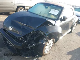 2019 Volkswagen Beetle S with VIN 3VW5DAAT3KM511269, listed as a IAAI auction lot 41473431 with 34,757 mi miles and . Bid and sale history available at DreamBid. Image 2.