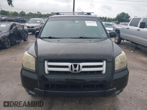 2007 Honda Pilot EX-L with VIN 5FNYF28577B028130, listed as a IAAI auction lot 42434714 with 179,299 mi miles and . Bid and sale history available at DreamBid. Image 12.