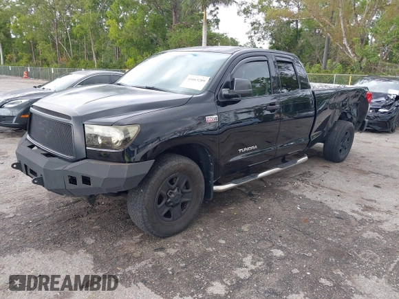 2011 Toyota Tundra 2WD Truck SR with VIN 5TFTY5F14BX007238, listed as a IAAI auction lot 41663289 with 126,499 mi miles. Bid and sale history available at carsss.com. Image 2.