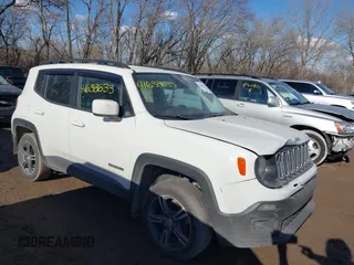 2015 Jeep Renegade Latitude z VIN ZACCJBBT0FPB55231, wystawiony jako IAAI lot #41638633 z przebiegiem 177 350 mil mil oraz . Historia ofert i sprzedaży dostępna na DreamBid. Obrazek 13.