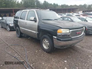 2003 GMC Yukon SLT with VIN 1GKEC13Z43J327937, listed as a IAAI auction lot 41543517 with 277,485 mi miles. Bid and sale history available at carsss.com. Image 1.
