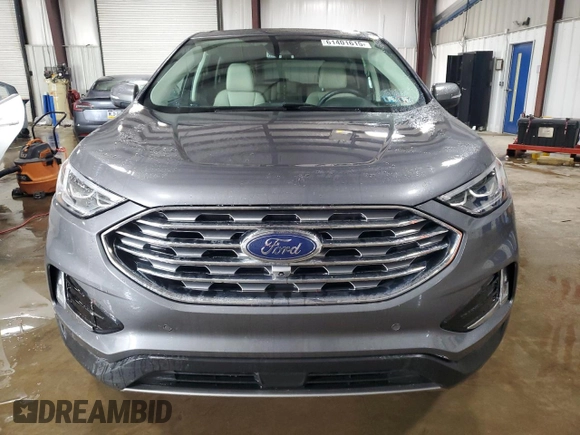 2021 Ford Edge Titanium with VIN 2FMPK4K96MBA38750, listed as a Copart auction lot 61401615 with 34,778 mi miles and Salvage title. Bid and sale history available at DreamBid. Image 5.