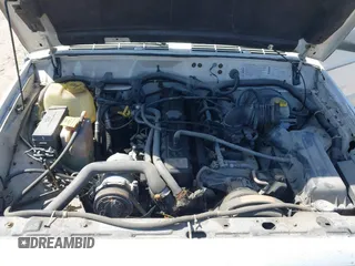 1996 Jeep Cherokee SE with VIN 1J4FT28S7TL307603, listed as a IAAI auction lot 42087278 with 141,994 mi miles. Bid and sale history available at carsss.com. Image 10.