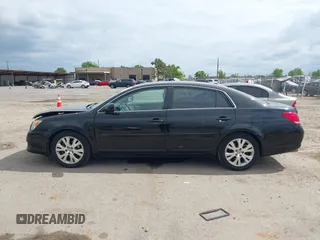 2009 Toyota Avalon XL with VIN 4T1BK36B79U327316, listed as a IAAI auction lot 42130918 with 184,948 mi miles. Bid and sale history available at carsss.com. Image 14.