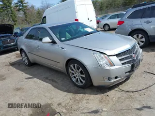 2008 Cadillac CTS RWD w/1SB with VIN 1G6DV57V380138406, listed as a IAAI auction lot 42048658 with 125,923 mi miles. Bid and sale history available at carsss.com. Image 1.
