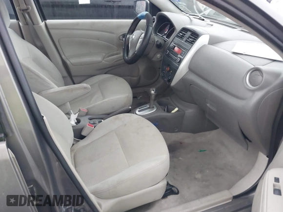 2015 Nissan Versa SV with VIN 3N1CN7AP0FL881056, listed as a IAAI auction lot 42106423 with 134,760 mi miles. Bid and sale history available at carsss.com. Image 5.