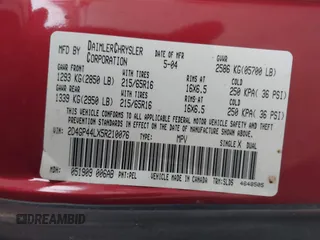 2005 Dodge Caravan SXT with VIN 2D4GP44LX5R210076, listed as a IAAI auction lot 41856927 with 291,712 mi miles and . Bid and sale history available at carsss.com. Image 9.