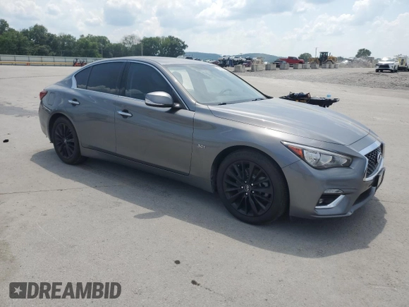 2019 Infiniti Q50 Luxe with VIN JN1EV7AP7KM516284, listed as a Copart auction lot 61647345 with 71,217 mi miles and Salvage title. Bid and sale history available at DreamBid. Image 4.